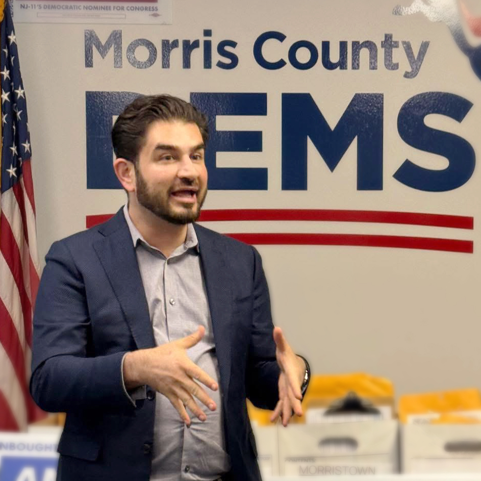 Ahmad Saleh speaking at a Morris County Democrats event
